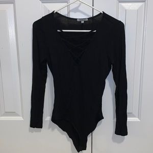Charlotte Russe criss cross long sleeve bodysuit